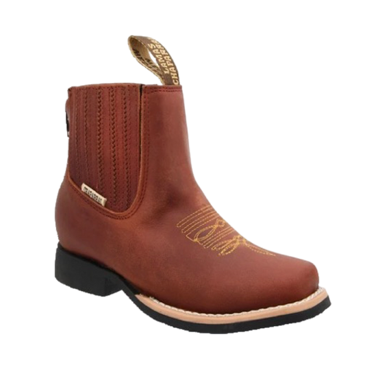 A traditional brown leather charro boot for children with decorative stitching and a square toe.