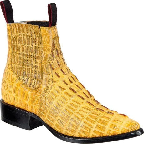 Yellow textured ankle boot on a white background