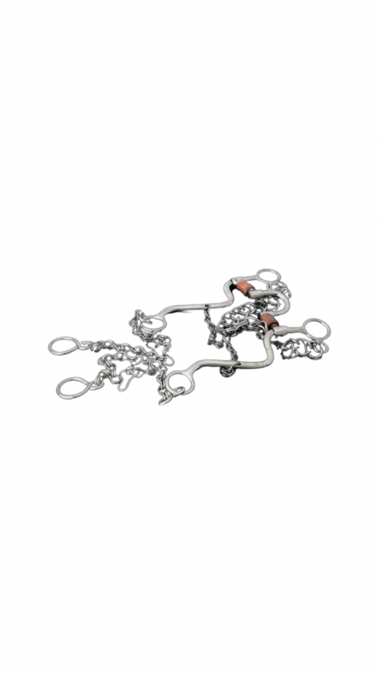 A traditional Mexican charro-style horse bit with silver detailing and decorations.