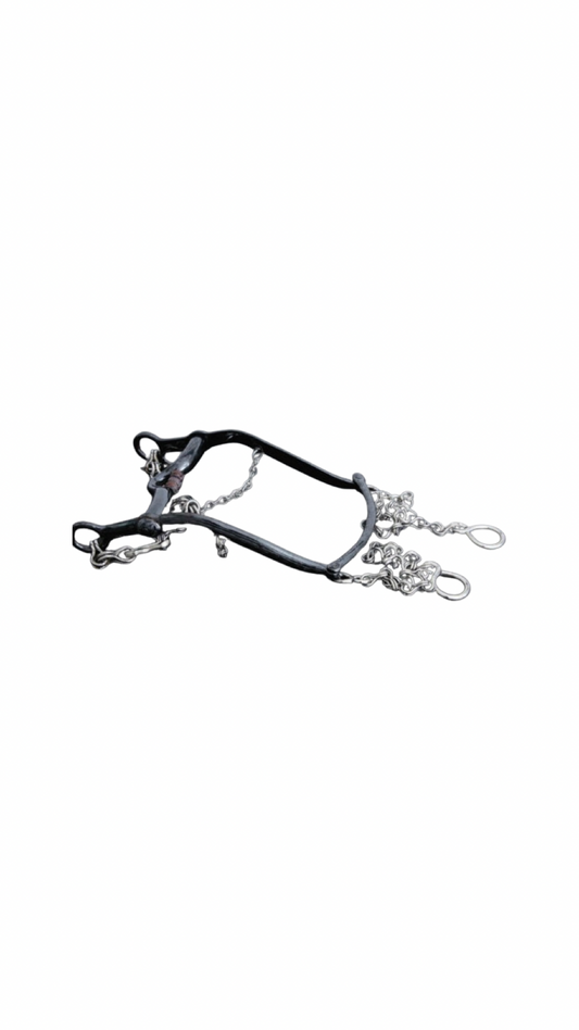 A black horse brake with nickel-plated iron and ornamental details.