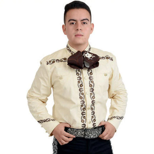 A man wearing a traditional Charro shirt with embroidery and unique buttons, commonly associated with Mexican elegance and craftsmanship.