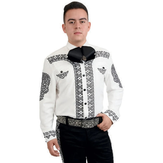 A man wearing a traditional white Charro shirt with black embroidery and unique buttons.