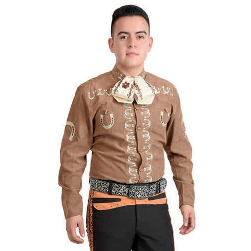A man wearing a brown traditional charro shirt with white embroidery, a large bow tie, and a belt with a buckle.