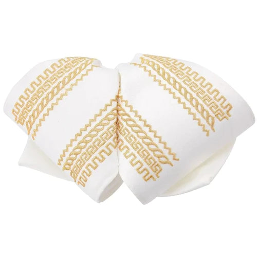 A traditional Mexican charro bow with white satin and gold embroidery, designed for adult females.