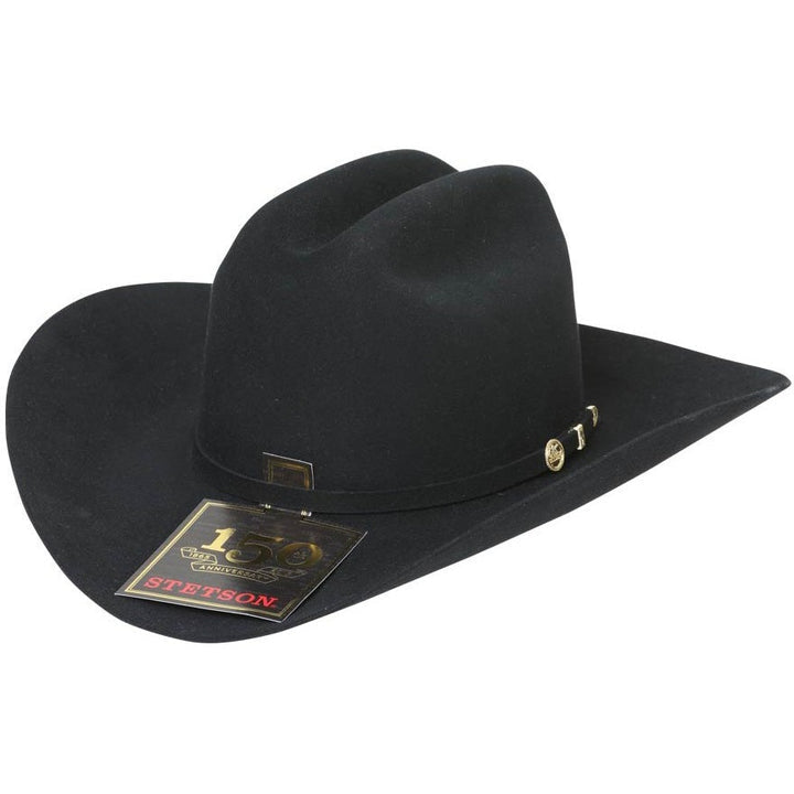 A black Stetson cowboy hat with a 10K gold three-piece buckle set on the band, including the Stetson crest emblem.