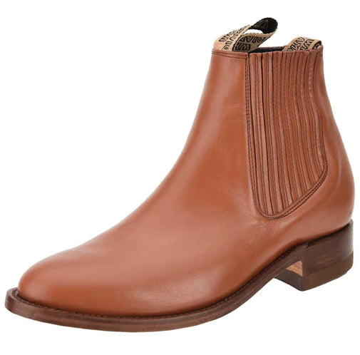 A brown leather Charro ankle boot for men with a round toe and a low heel.