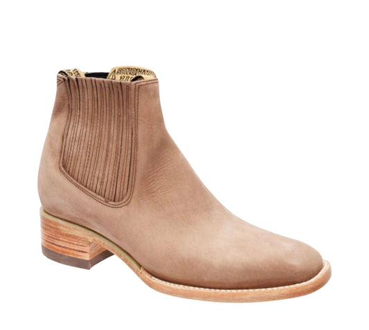 Beige ankle boot on a white background
