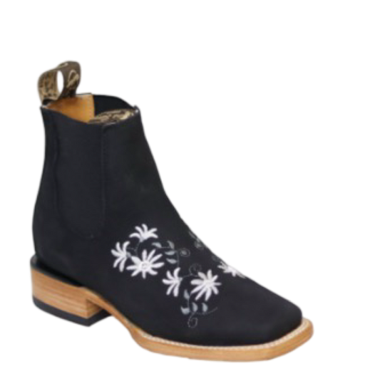A black leather boot with white floral embroidery on the top and a brown sole.