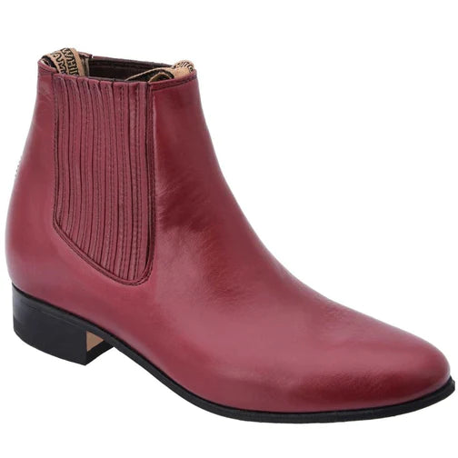 A red leather Charro ankle boot for men with a round toe and traditional low heel.