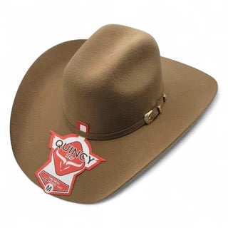 Brown cowboy hat with a red and white label on a white background