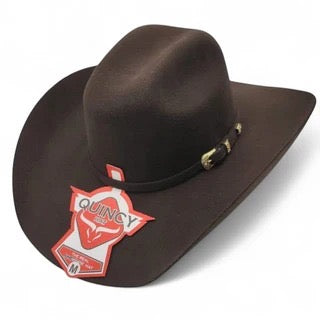 Brown cowboy hat with a red and white label on a white background
