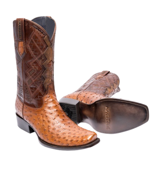 A pair of brown ostrich skin boots with a unique texture, featuring a square toe style and visible quill bumps on the shaft.