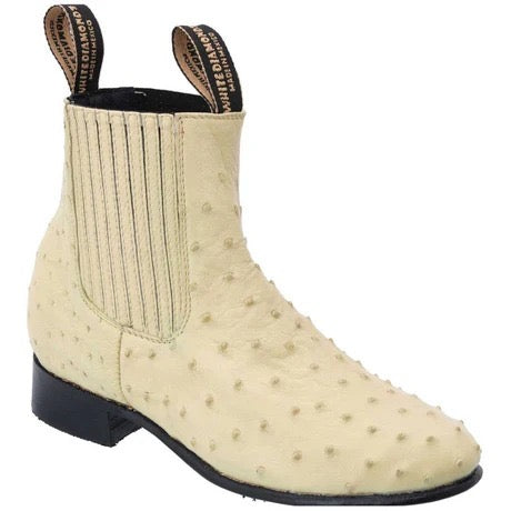 Beige leather boot with black sole on a white background