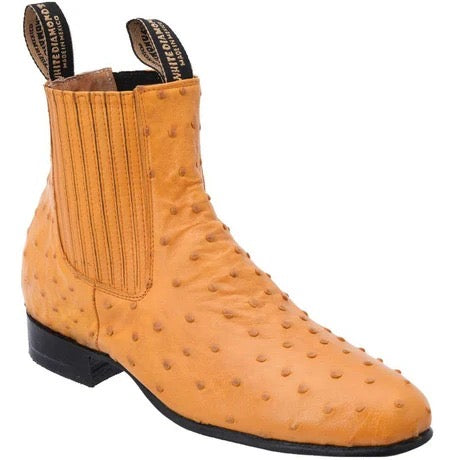 Tan ostrich-patterned boot with black sole on a white background
