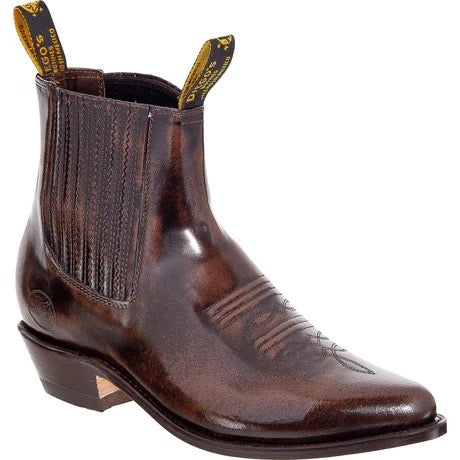 Brown leather boot with stitching details on a white background