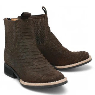 Pair of brown ankle boots on a white background