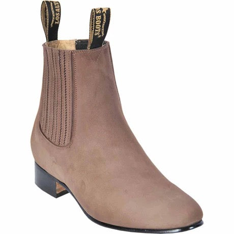Brown Chelsea boot with elastic side panels on a white background