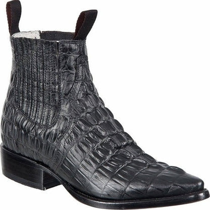 Black crocodile-patterned boot on a white background