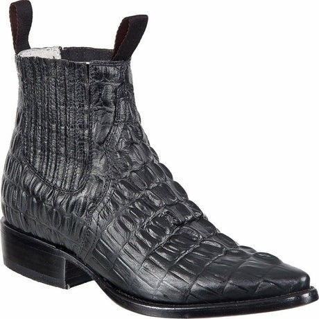 Black crocodile-patterned boot on a white background