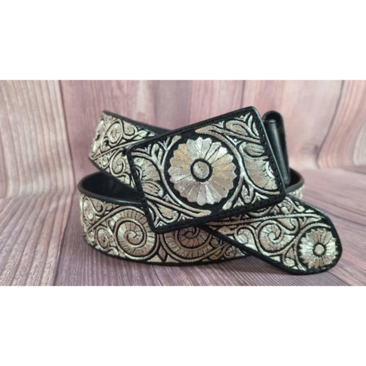 A traditional Mexican 'charro' style belt with silver thread embroidery on a black leather strap, featuring a floral and geometric pattern.