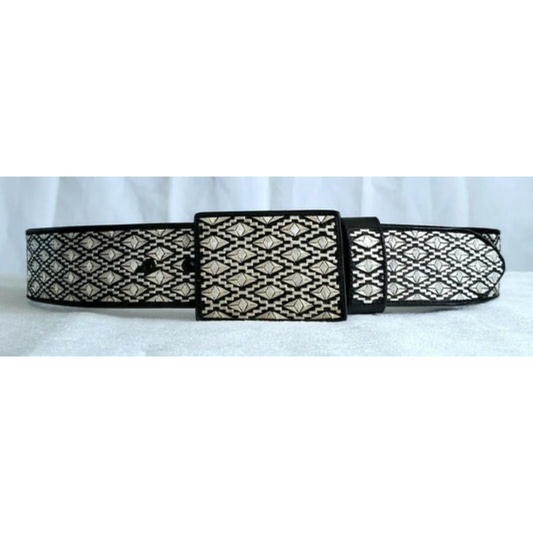 A traditional Mexican 'charro' style belt with silver thread embroidery on a black background, featuring a metallic buckle.