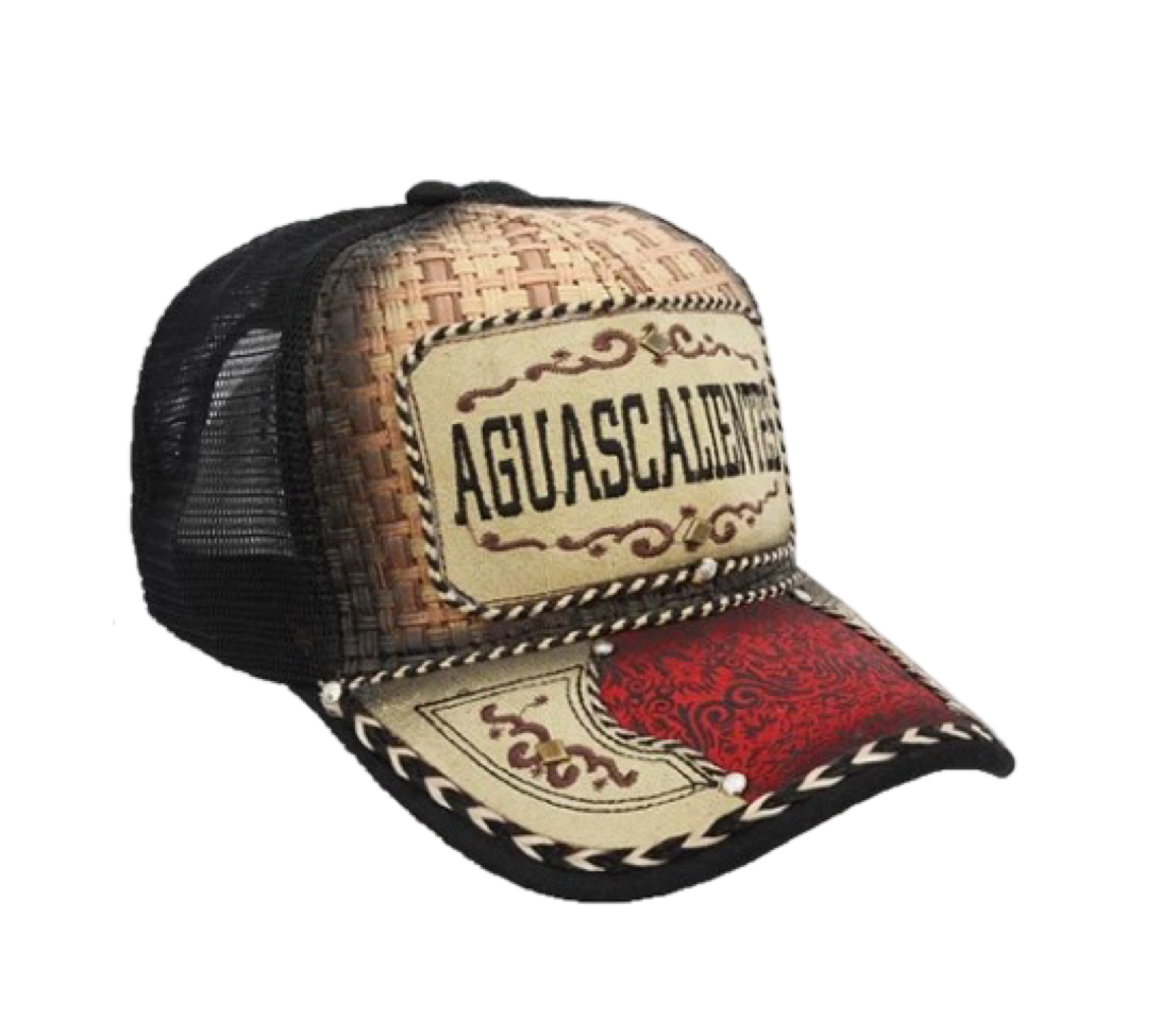 A trucker cap with a western design, featuring a curved visor, structured front panel, and breathable mesh back. It has embroidered text and a red and white geometric pattern.