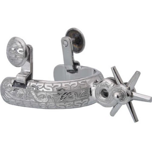 A traditional charro spur with a silver finish, featuring hand-chased or engraved details and a rotating wheel.