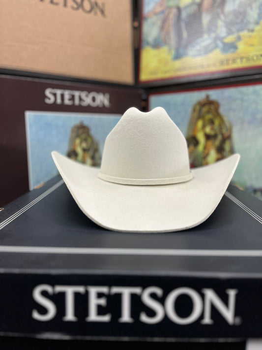 White cowboy hat on a Stetson branded box with a blurred background