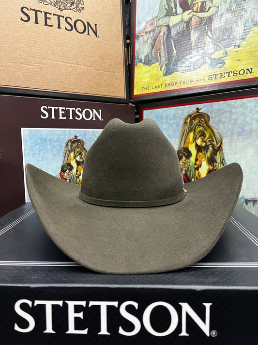 Brown Stetson hat on a branded box with Stetson logo