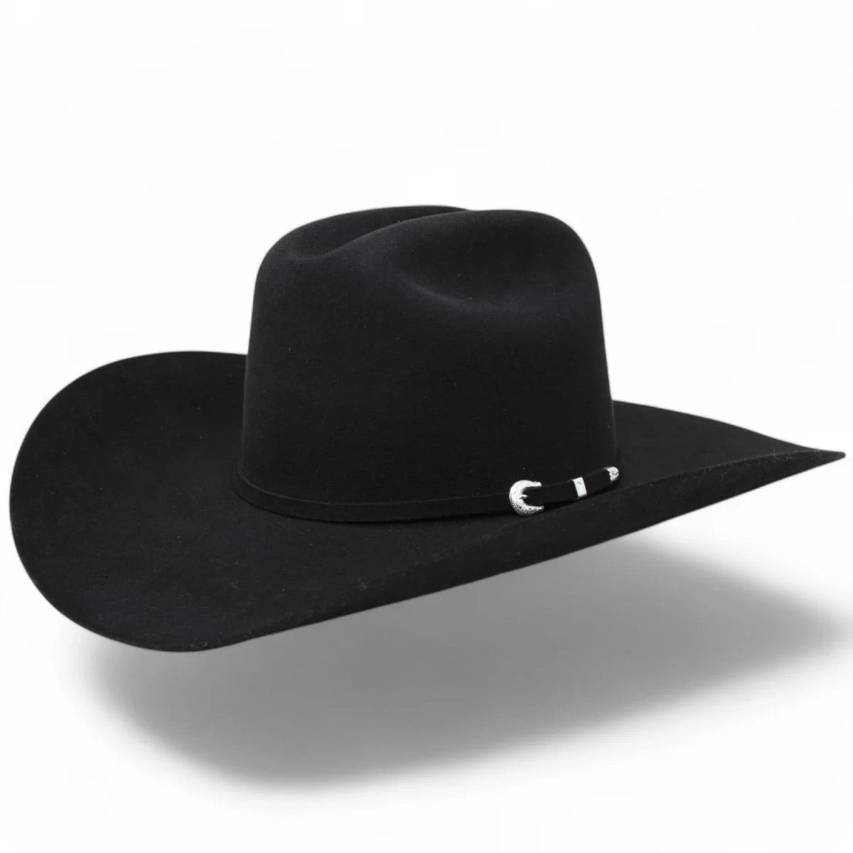 Black cowboy hat with a belt on a white background