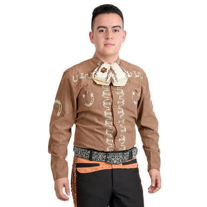 A man wearing a brown traditional charro shirt with white embroidery, a large bow tie, and a belt with a buckle.