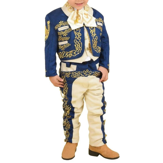 A young boy wearing a traditional charro outfit with blue jacket and white pants, featuring gold embroidery and a white shirt.