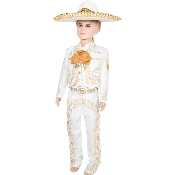 A young boy wearing a traditional charro outfit with white shirt and pants, gold embroidery, and a sombrero.