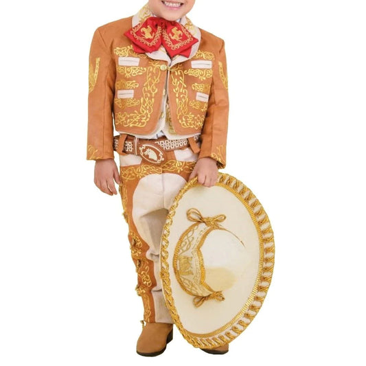 A young boy wearing a traditional charro suit with ornate embroidery, holding a sombrero.