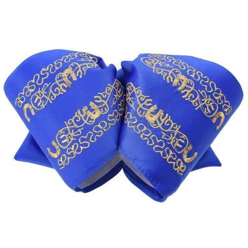 A traditional blue charro bow with gold embroidery, representing the product 'Moños Charros White Diamond'. The bow tie is made from satin and features a classic, elegant design with intricate embroidery patterns.